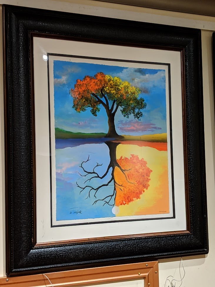 a painting from date night - two trees representing all 4 seasons